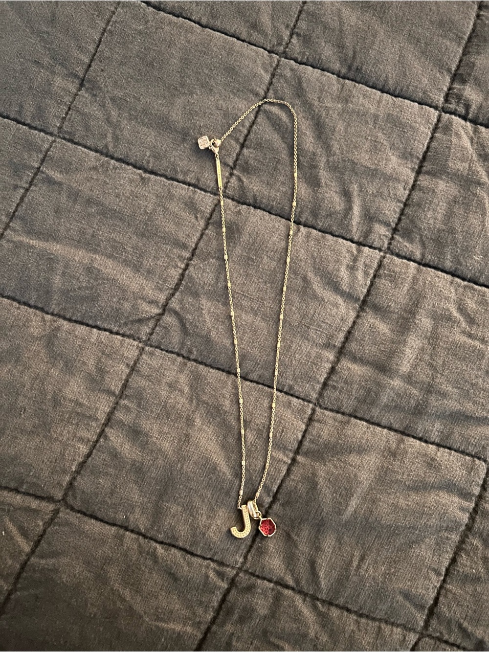 Kendra Scott Gold “J” Letter necklace with Ruby birthstone